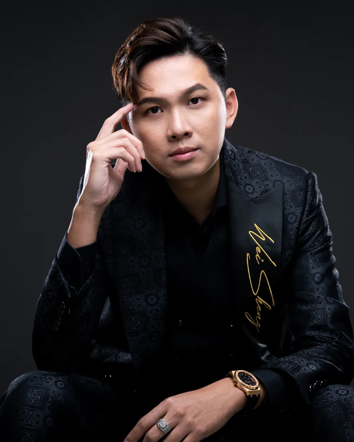 Portrait of Soh Wei Sheng, founder of Modus Group, in a black suit